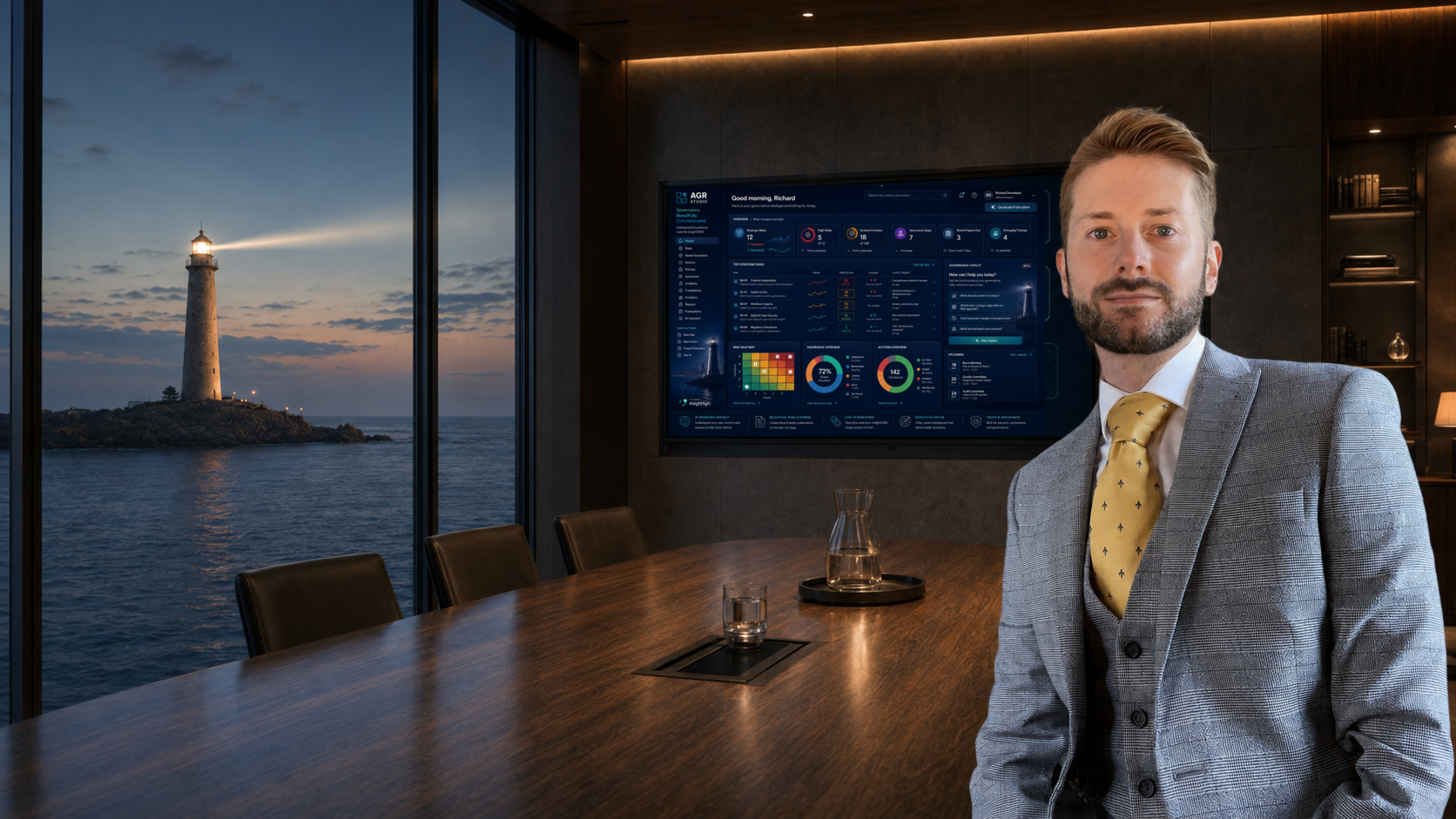Richard Mackie in the AGR Board Suite with Risk Studio on screen and the AGR lighthouse outside